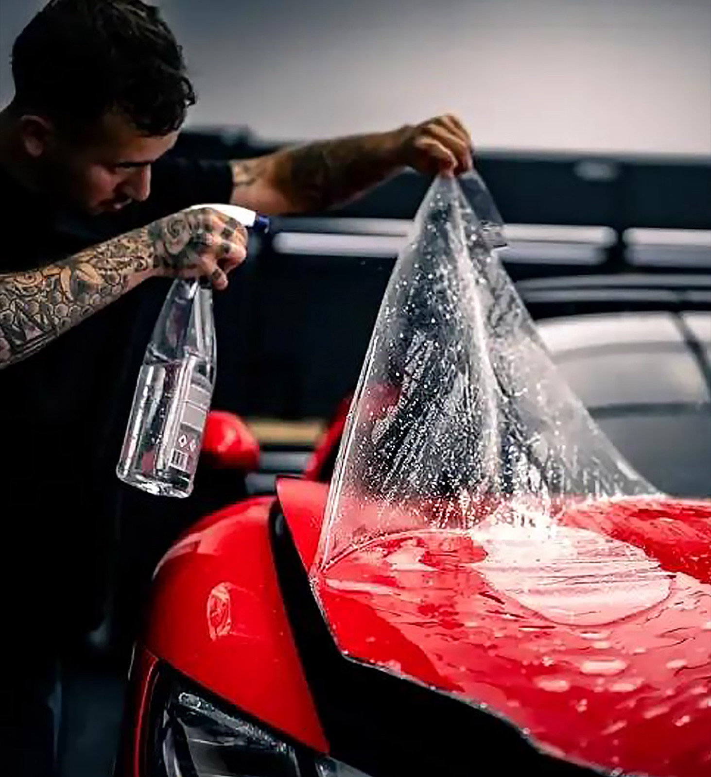 Clear self-healing paint protection film installed on Porsche supercar front bumper